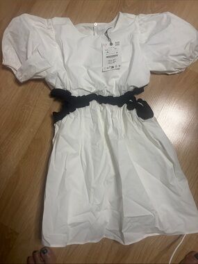 Girls White Puff Sleeve Dress with Black Waist Tie